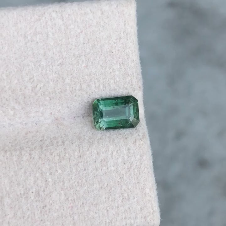 Load video: Green tourmaline emerald cut gemstone jewelry